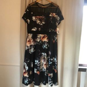 Beautiful fall inspired cocktail dress with pockets.